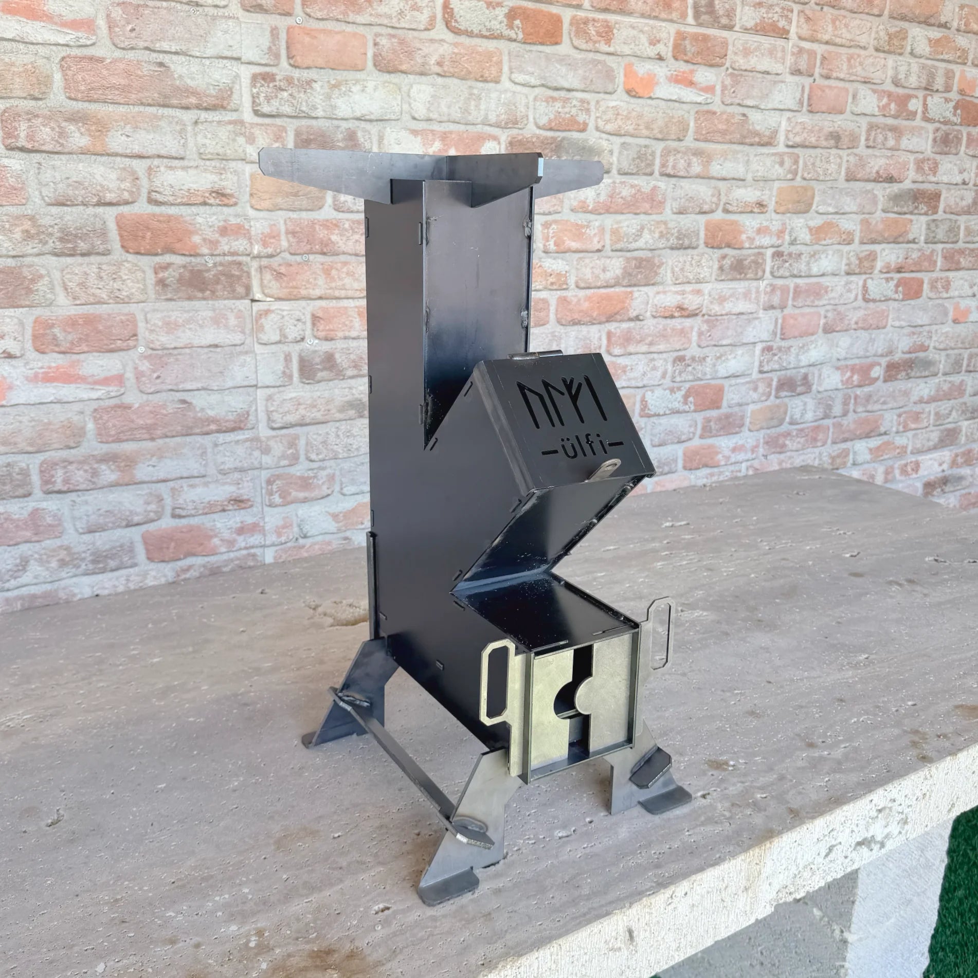Rocket stove MAGMA en cuisson au feu de bois
